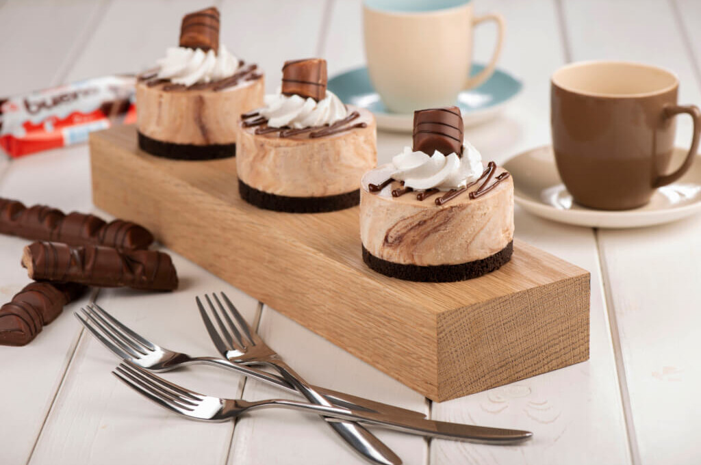 Ferrero cheesecake on wooden board